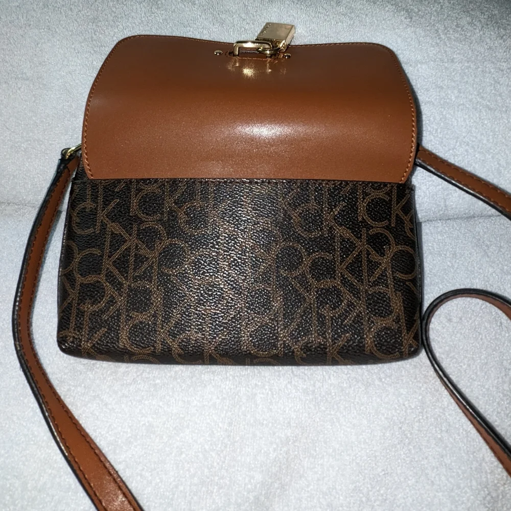 Calvin Klein brown signature Roxy crossbody bag.